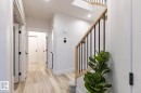 Foyer featuring light wood-style floors and recessed lighting - 6275 180 Avenue, Edmonton, AB  - Indoor Photo Showing Other Room 