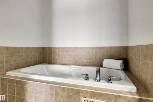 Bathroom with a bath - 3401 47 Street, Beaumont, AB - Indoor Photo Showing Bathroom