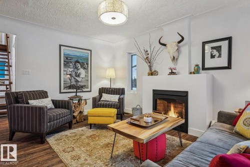 9602 83 Avenue, Edmonton, AB - Indoor Photo Showing Living Room With Fireplace