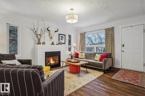 9602 83 Avenue, Edmonton, AB - Indoor Photo Showing Living Room With Fireplace