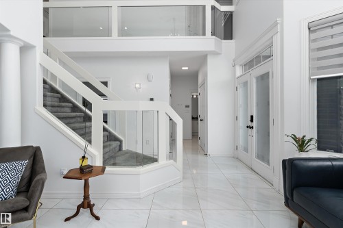 Entryway with stairway and a high ceiling - 1242 Starling Drive, Edmonton, AB - Indoor Photo Showing Other Room