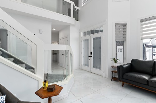 Interior space featuring french doors and a high ceiling - 1242 Starling Drive, Edmonton, AB - Indoor Photo Showing Other Room