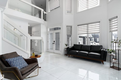 Community lobby featuring a high ceiling - 1242 Starling Drive, Edmonton, AB - Indoor