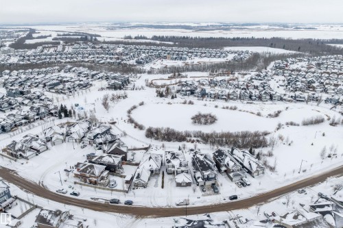 Snowy aerial view with a residential view - 1242 Starling Drive, Edmonton, AB - Outdoor With View