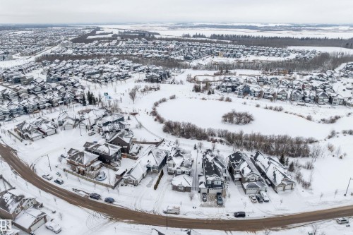 Snowy aerial view with a residential view - 1242 Starling Drive, Edmonton, AB - Outdoor With View