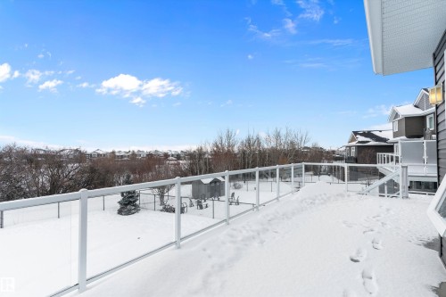 Snowy yard featuring a deck - 1242 Starling Drive, Edmonton, AB - Outdoor