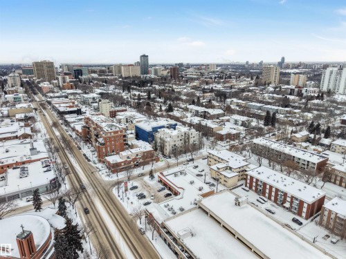 Snowy aerial view with a city view - 102 10711 83 Avenue, Edmonton, AB - Outdoor With View