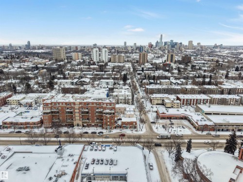 Snowy aerial view with a skyline view - 102 10711 83 Avenue, Edmonton, AB - Outdoor With View