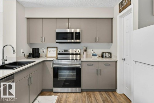 2037 Westerra Loop, Stony Plain, AB - Indoor Photo Showing Kitchen With Double Sink
