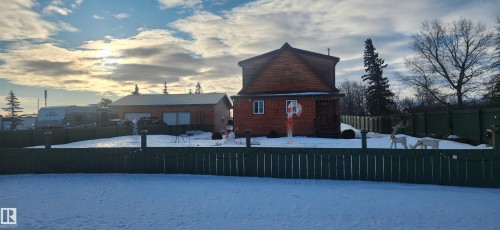 View of front of home featuring an attached garage - 5216 - 53 Avenue, Clyde, AB - Outdoor