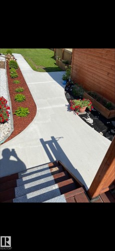 View of patio / terrace with a vegetable garden - 5216 - 53 Avenue, Clyde, AB - Outdoor