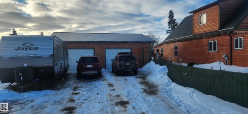 View of snow covered garage - 5216 - 53 Avenue, Clyde, AB - Outdoor