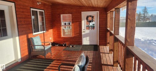 Sunroom with vaulted ceiling - 5216 - 53 Avenue, Clyde, AB - Outdoor With Deck Patio Veranda With Exterior