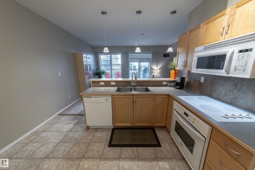 150 4827 104A Street, Edmonton, AB - Indoor Photo Showing Kitchen With Double Sink