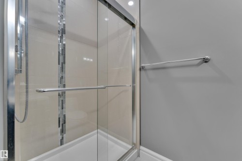 Bathroom with a stall shower - 2612 Adam Court Sw, Edmonton, AB - Indoor Photo Showing Bathroom