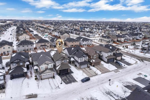 Snowy aerial view with a residential view - 2612 Adam Court Sw, Edmonton, AB - Outdoor With View