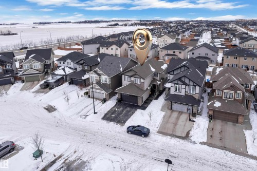 Snowy aerial view with a residential view - 2612 Adam Court Sw, Edmonton, AB - Outdoor