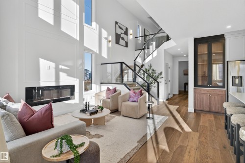 213 Paterson Link, Edmonton, AB - Indoor Photo Showing Living Room With Fireplace
