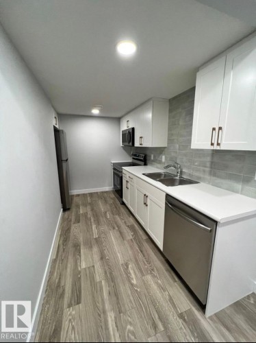 5316 Godson Point(E), Edmonton, AB - Indoor Photo Showing Kitchen With Double Sink