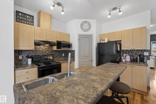 3955 Mcmullen Green, Edmonton, AB - Indoor Photo Showing Kitchen With Double Sink
