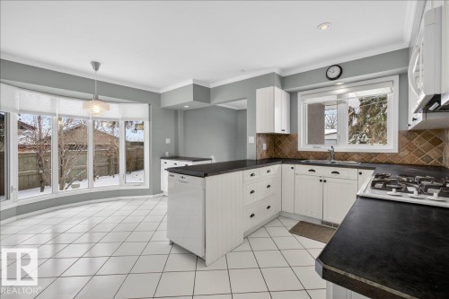 9415 128A Avenue, Edmonton, AB - Indoor Photo Showing Kitchen With Double Sink