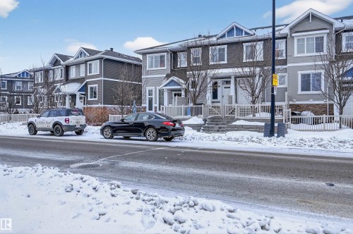 View of front of house featuring a residential view - 14 1140 Chappelle Boulevard, Edmonton, AB - Outdoor With Facade