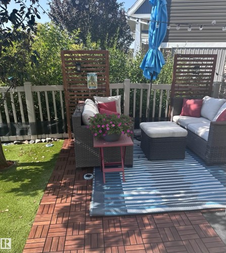 Wooden terrace with outdoor lounge area - 14 1140 Chappelle Boulevard, Edmonton, AB - Outdoor With Deck Patio Veranda