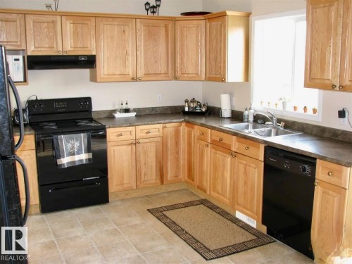 93 3380 28A Avenue Nw, Edmonton, AB - Indoor Photo Showing Kitchen With Double Sink