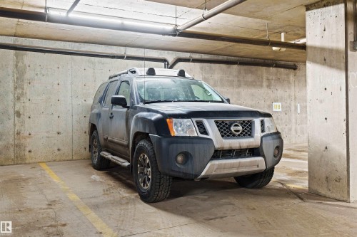 320 4309 33 Street, Stony Plain, AB - Indoor Photo Showing Garage
