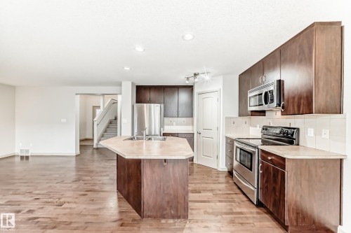 5930 165 Avenue, Edmonton, AB - Indoor Photo Showing Kitchen With Stainless Steel Kitchen With Double Sink