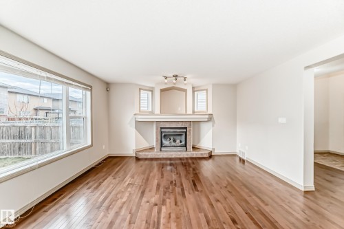 5930 165 Avenue, Edmonton, AB - Indoor Photo Showing Living Room With Fireplace
