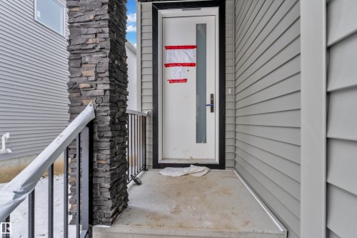 View of exterior entry - 231 Crystal Creek Drive, Leduc, AB - Outdoor