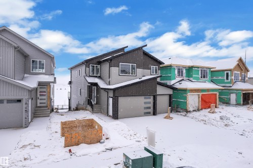 View of front of property with a residential view - 231 Crystal Creek Drive, Leduc, AB - Outdoor With Facade