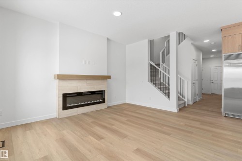 2244 4 Avenue, Edmonton, AB - Indoor Photo Showing Living Room With Fireplace