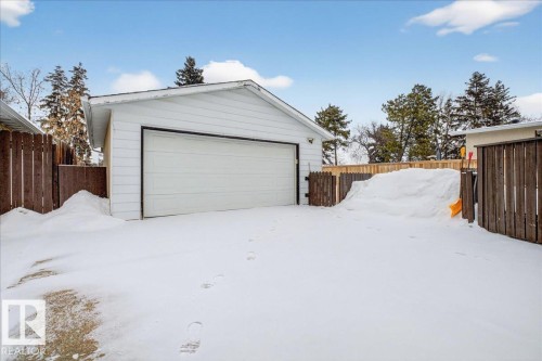 Snow covered garage with a detached garage - 8804 38 Avenue, Edmonton, AB - Outdoor With Exterior