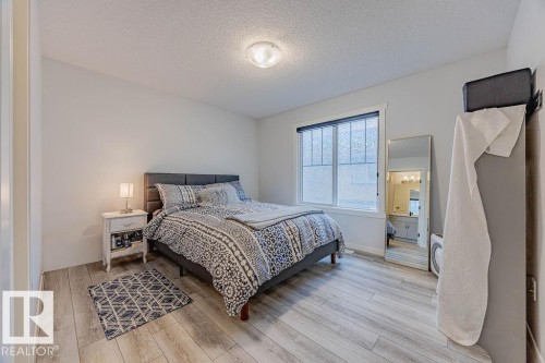 63 50 Mclaughlin Drive, Spruce Grove, AB - Indoor Photo Showing Bedroom