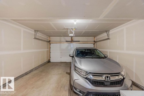 63 50 Mclaughlin Drive, Spruce Grove, AB - Indoor Photo Showing Garage
