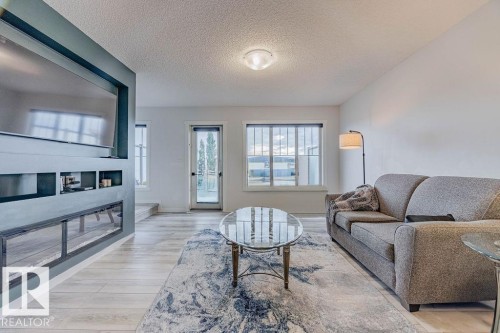63 50 Mclaughlin Drive, Spruce Grove, AB - Indoor Photo Showing Living Room