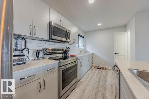 63 50 Mclaughlin Drive, Spruce Grove, AB - Indoor Photo Showing Kitchen