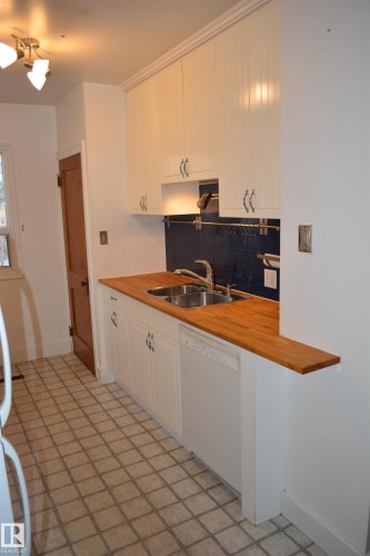 7727 112S Avenue, Edmonton, AB - Indoor Photo Showing Kitchen With Double Sink