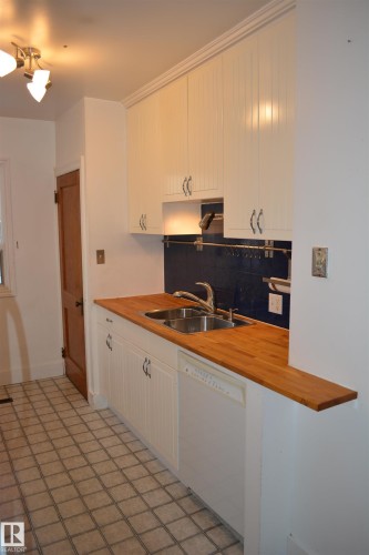 7727 112S Avenue, Edmonton, AB - Indoor Photo Showing Kitchen With Double Sink