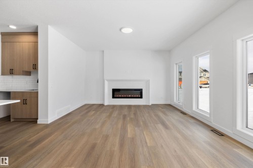 1077 Cristall Crescent, Edmonton, AB - Indoor Photo Showing Living Room With Fireplace