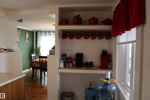 Builtin Shelving - 56 4204 47St., Wetaskiwin, AB - Indoor Photo Showing Other Room