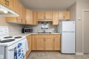 4 8803 101 Street, Edmonton, AB  - Indoor Photo Showing Kitchen With Double Sink 