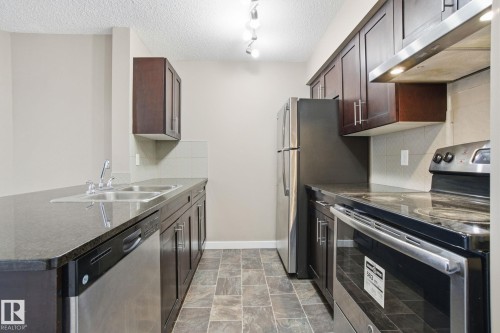 316 3315 James Mowatt Trail, Edmonton, AB - Indoor Photo Showing Kitchen With Double Sink