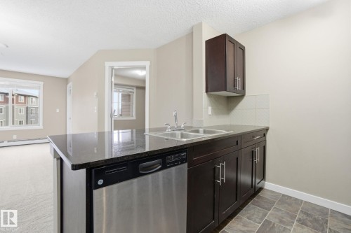316 3315 James Mowatt Trail, Edmonton, AB - Indoor Photo Showing Kitchen With Double Sink