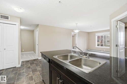 316 3315 James Mowatt Trail, Edmonton, AB - Indoor Photo Showing Kitchen With Double Sink