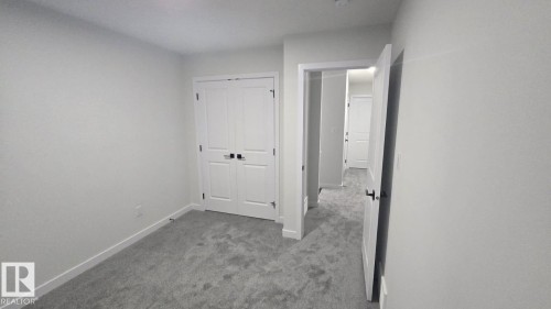 Mainfloor 338 Munn Way, Leduc, AB - Indoor Photo Showing Other Room