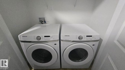 Mainfloor 338 Munn Way, Leduc, AB - Indoor Photo Showing Laundry Room