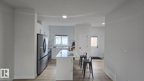 Mainfloor 338 Munn Way, Leduc, AB - Indoor Photo Showing Other Room